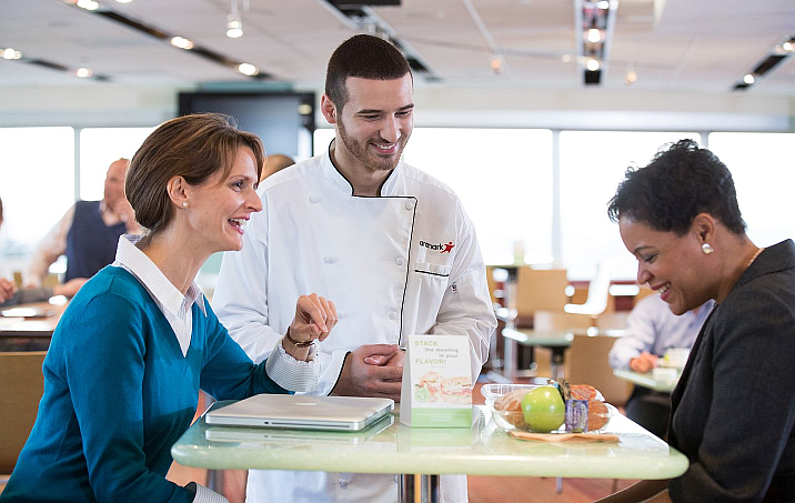 chef talking to customers